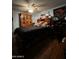 Bedroom with wooden furniture, ceiling fan, and wood-look floors at 11596 W Sierra Dawn Blvd # 156, Surprise, AZ 85378