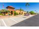 Community center exterior with golf cart parking at 11596 W Sierra Dawn Blvd # 156, Surprise, AZ 85378