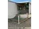 Front exterior view of a single-story home with a covered porch and fenced yard at 11596 W Sierra Dawn Blvd # 156, Surprise, AZ 85378
