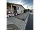 Front yard view with holiday decorations and walkway at 11596 W Sierra Dawn Blvd # 156, Surprise, AZ 85378