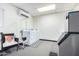 Laundry area with washers, dryers, ice machine, and seating at 11596 W Sierra Dawn Blvd # 156, Surprise, AZ 85378