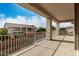 Balcony overlooking neighborhood homes and a pool at 15835 W Desert Mirage Dr, Surprise, AZ 85379