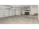 Two-car garage with overhead storage at 15835 W Desert Mirage Dr, Surprise, AZ 85379