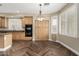 Spacious kitchen with wood cabinets, granite countertops, and stainless steel appliances at 15835 W Desert Mirage Dr, Surprise, AZ 85379