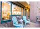 Brick patio with two chairs and a small table at 17 W Vernon Ave # 103, Phoenix, AZ 85003