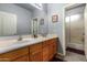 Clean bathroom with double vanity and shower/tub combo at 20171 N Bustos Way, Maricopa, AZ 85138