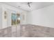 Spacious bedroom with tiled floor and large window at 20171 N Bustos Way, Maricopa, AZ 85138