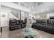 Open living area with high ceilings and access to kitchen at 20171 N Bustos Way, Maricopa, AZ 85138