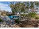 Inviting pool area with patio furniture and lush landscaping at 20171 N Bustos Way, Maricopa, AZ 85138