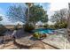 Inviting pool area with flagstone patio and landscaping at 20171 N Bustos Way, Maricopa, AZ 85138