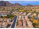 Aerial shot pinpointing a home in a community with mountain views and amenities at 26662 N Babbling Brook Dr, Phoenix, AZ 85083