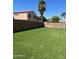Spacious backyard with artificial turf, perfect for outdoor activities at 3333 E Powell Pl, Chandler, AZ 85249