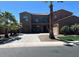 Attractive two-story home with palm trees, a paved driveway, and a three-car garage at 3333 E Powell Pl, Chandler, AZ 85249