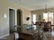 Spacious kitchen featuring an island, granite countertops, and a dining area at 3333 E Powell Pl, Chandler, AZ 85249
