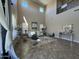 Grand living room with high ceilings, tile floors, and large windows at 3333 E Powell Pl, Chandler, AZ 85249