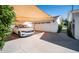 Attached garage with a carport and shade sail for parking at 4108 E Stanford Dr, Phoenix, AZ 85018