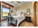 Bedroom with ornate bed frame and tiled floors at 5745 E Azure Hills Dr, Cave Creek, AZ 85331