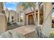 Charming courtyard entry with fountain and tile flooring at 5745 E Azure Hills Dr, Cave Creek, AZ 85331