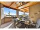 Covered patio with seating area and mountain views at 5745 E Azure Hills Dr, Cave Creek, AZ 85331