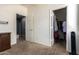 Spacious bedroom with walk-in closet and carpet at 8878 W Cameron Dr, Peoria, AZ 85345