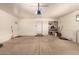 Spacious garage with built-in shelving and storage space at 10330 W Desert Forest Cir, Sun City, AZ 85351