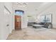 Bright and airy living room with tile floors and comfortable seating at 11137 E Running Deer Trl, Scottsdale, AZ 85262