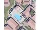 Aerial view of community pool and surrounding buildings at 1120 N Val Vista Dr # 77, Gilbert, AZ 85234