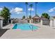 Community pool with patio and seating area at 1120 N Val Vista Dr # 77, Gilbert, AZ 85234