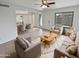 Bright living room with comfy seating and dining area at 1433 N 53Rd Ave, Phoenix, AZ 85043