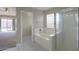 Relaxing bathroom with bathtub and shower at 19776 N Harris N Dr, Maricopa, AZ 85138
