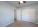 Bedroom with double door closet and carpet floors at 19776 N Harris N Dr, Maricopa, AZ 85138