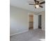 Bedroom with walk-in closet and ceiling fan at 19776 N Harris N Dr, Maricopa, AZ 85138