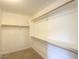 Large walk-in closet with ample shelving at 19776 N Harris N Dr, Maricopa, AZ 85138