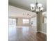 Bright dining room with hardwood floors and a chandelier at 19776 N Harris N Dr, Maricopa, AZ 85138