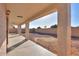 Covered patio with access to the backyard at 19776 N Harris N Dr, Maricopa, AZ 85138