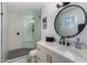 Updated bathroom featuring a walk-in shower, modern vanity, and stylish fixtures at 2041 E Harvard Dr, Tempe, AZ 85283