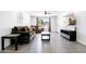 Cozy living room with comfortable furniture, a ceiling fan, and wood-look flooring at 2041 E Harvard Dr, Tempe, AZ 85283