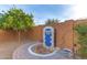 A backyard water feature with decorative tile and pavers at 21425 N 262Nd Dr, Buckeye, AZ 85396