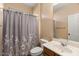 Clean bathroom with shower/tub combo, vanity, and tiled flooring at 2981 E Fandango Dr, Gilbert, AZ 85298