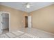 Empty bedroom with neutral walls, ceiling fan, and walk-in closet at 2981 E Fandango Dr, Gilbert, AZ 85298