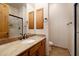 Clean and modern bathroom with tiled flooring and wooden cabinetry at 33296 N Vanishing Trl, Scottsdale, AZ 85266