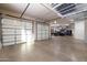 Spacious garage interior with ample storage and workspace at 33296 N Vanishing Trl, Scottsdale, AZ 85266