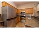 Updated kitchen featuring stainless steel appliances and granite countertops at 33296 N Vanishing Trl, Scottsdale, AZ 85266