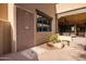 Outdoor shower with a stylish tile design, adjacent to the patio at 33296 N Vanishing Trl, Scottsdale, AZ 85266