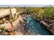 Tranquil backyard oasis with a custom pool, spa, and desert views at 33296 N Vanishing Trl, Scottsdale, AZ 85266