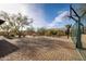 Private sport court perfect for basketball, surrounded by desert plants at 33296 N Vanishing Trl, Scottsdale, AZ 85266