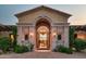 Grand entry with arched doorway and chandelier at 4308 N Sage Creek Cir, Mesa, AZ 85207