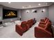 Luxurious home theater with large screen, comfortable seating, and ambient lighting at 4308 N Sage Creek Cir, Mesa, AZ 85207