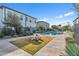 Community pool area with a picnic table and lounge chairs at 4316 E Berkeley Rd, Phoenix, AZ 85008