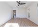 Spacious bedroom with wood floors and ensuite bathroom access at 705 W Vernon Ave, Phoenix, AZ 85007